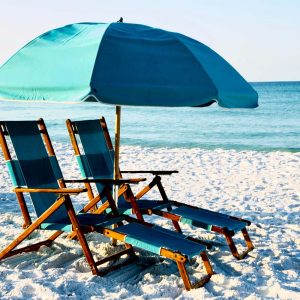 2 chairs and one beach umbrella